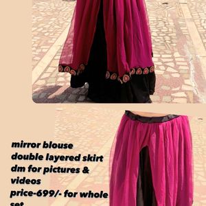 Red double layered skirt by Medhya