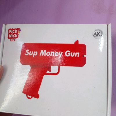 Fake supreme clearance money gun