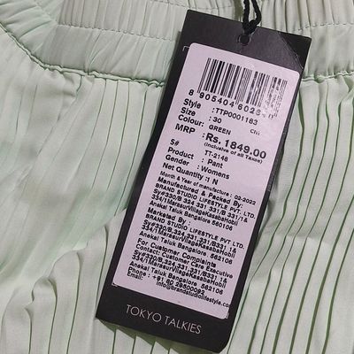 How do manufacturers attach these tags to pants? : r/retail