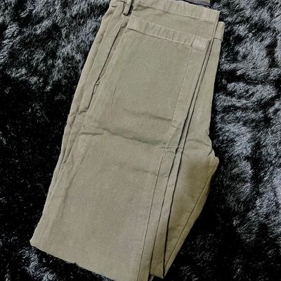 Peter England beige color round insert front pockets with jetted back  pocket comfort fit cotton trousers