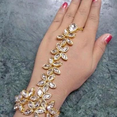 Buy Women's Brass Metal Kundan Stone Embellished Dual Finger Ring Bracelet  Online at desertcartINDIA