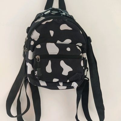 Cow print outlet mini backpack