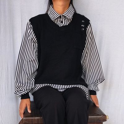 Black sweater with white blouse clearance attached