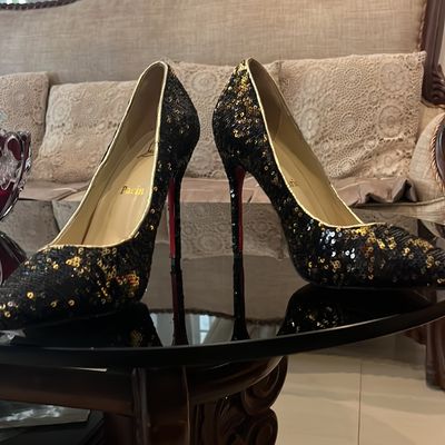 Black and gold red bottom heels sale