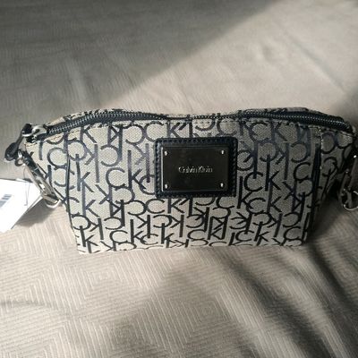 Calvin Klein Monogram Demi Shoulder Bag, Almond/Khaki/Camel, One Size :  Amazon.in: Shoes & Handbags
