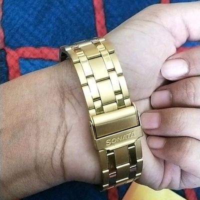 Sonata golden discount watch for men