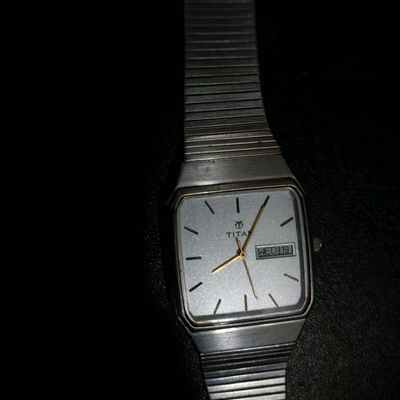 Titan quartz exacta watch price hot sale