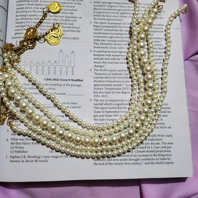 Read the following passage and complete the activitiesName the following1.  The magical thing in the necklace - Brainly.in