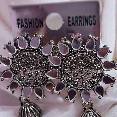 Black metal earrings on sale with mirror