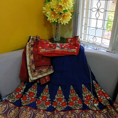 Red lehenga embroidered with blue velvet blouse | Wonder Robe