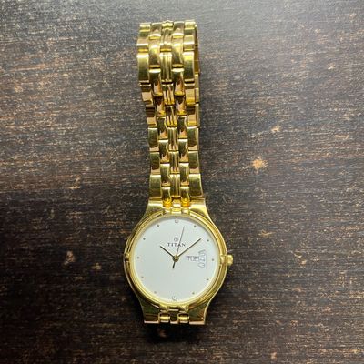 Titan watch golden discount color