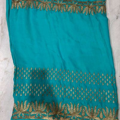 Attractive Cyan Color Border Work Organza Fabric Saree With Embroidere